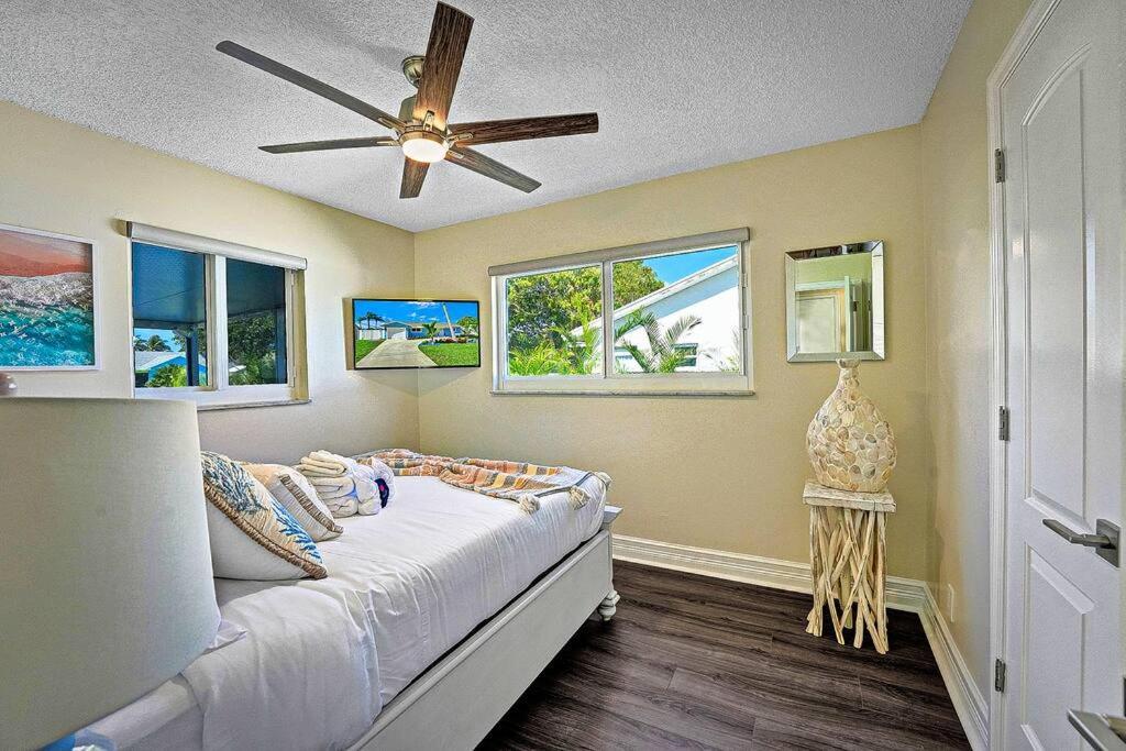 New Stunning Delray Waterfront Oasis - Heated Pool, Spa, Canal, Dock, Huge Patio, Pool Table! *