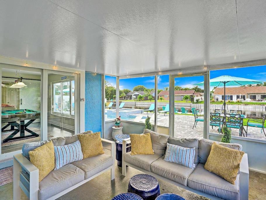 New Stunning Delray Waterfront Oasis - Heated Pool, Spa, Canal, Dock, Huge Patio, Pool Table! *