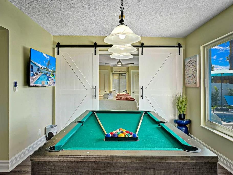 Holiday home New Stunning Delray Waterfront Oasis - Heated Pool, Spa, Canal, Dock, Huge Patio, Pool Table! *